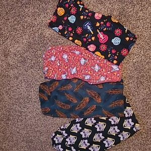 LULAROE Bundle FOUR pairs themed Tall Curvy Leggings Excellent preloved conditio